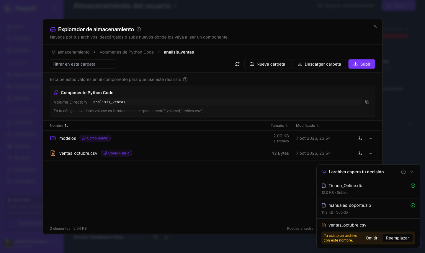 El panel de subidas con dos archivos subidos y uno pendiente de decidir si se reemplaza